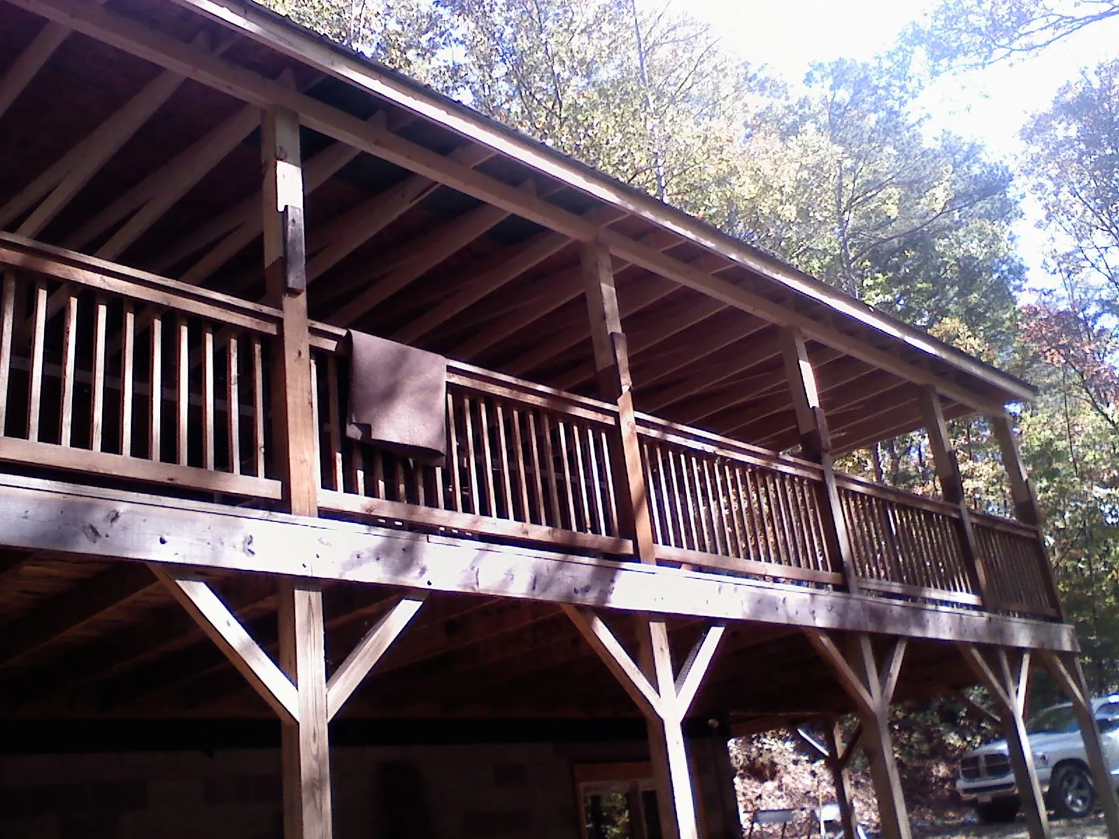 Timber framing under a new elevated porch and deck — Roof Leak Repair in Britton by Roofing Brothers